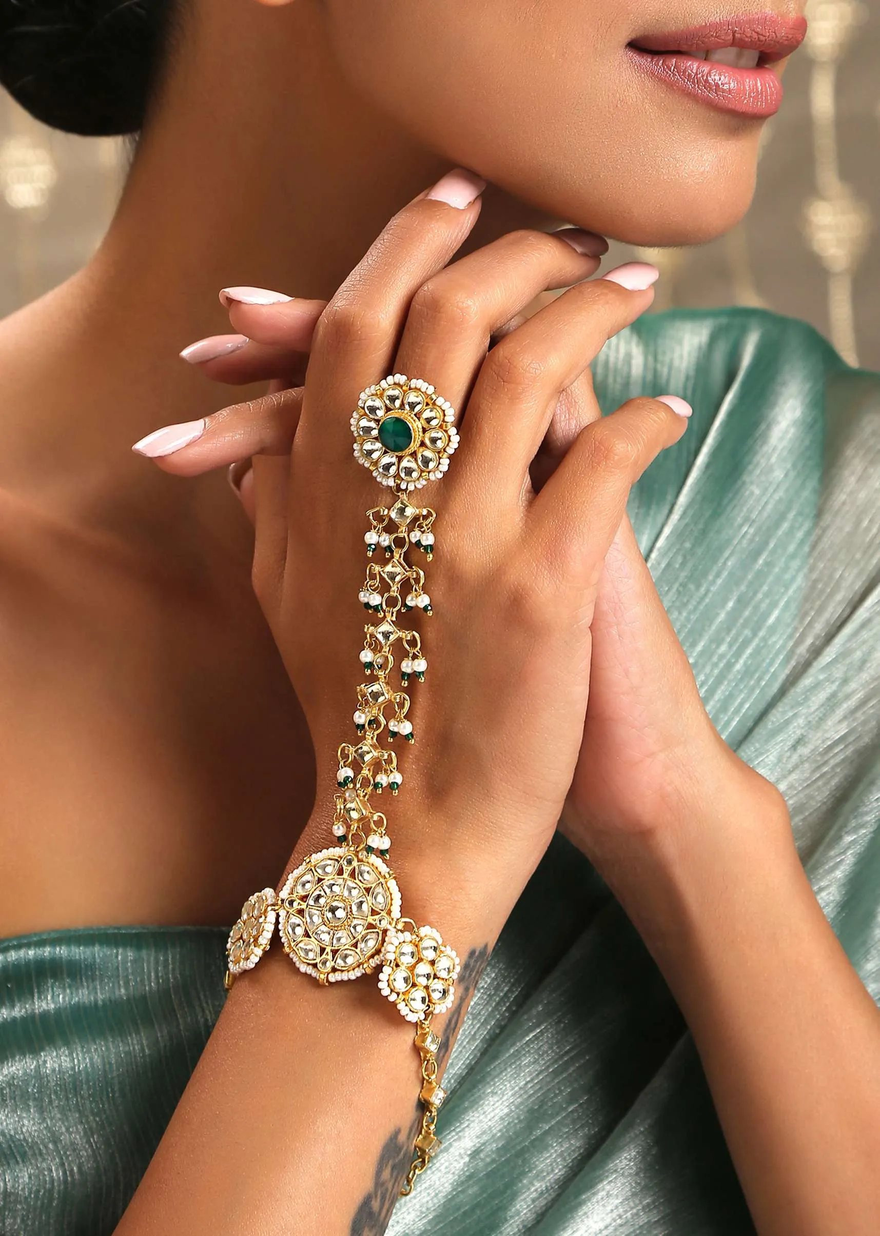 Gold Plated Kundan Haathphool Studded With Shell Pearls